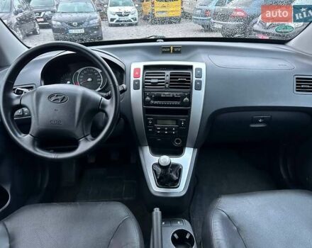 Чорний Хендай Туксон, об'ємом двигуна 2 л та пробігом 167 тис. км за 7950 $, фото 10 на Automoto.ua