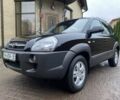 Черный Хендай Туксон, объемом двигателя 2 л и пробегом 186 тыс. км за 9400 $, фото 1 на Automoto.ua