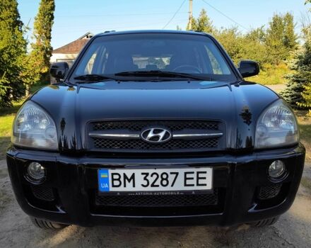 Черный Хендай Туксон, объемом двигателя 2 л и пробегом 206 тыс. км за 7500 $, фото 7 на Automoto.ua