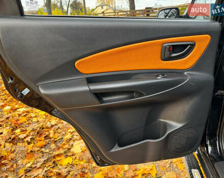 Черный Хендай Туксон, объемом двигателя 2 л и пробегом 210 тыс. км за 7990 $, фото 24 на Automoto.ua