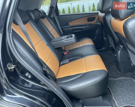 Черный Хендай Туксон, объемом двигателя 2 л и пробегом 216 тыс. км за 7500 $, фото 28 на Automoto.ua