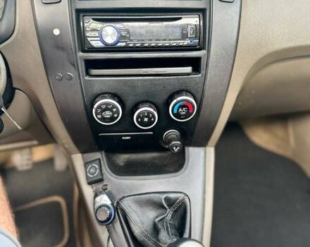 Черный Хендай Туксон, объемом двигателя 1.98 л и пробегом 277 тыс. км за 5350 $, фото 3 на Automoto.ua