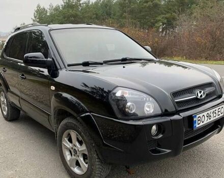 Черный Хендай Туксон, объемом двигателя 1.98 л и пробегом 196 тыс. км за 7700 $, фото 1 на Automoto.ua
