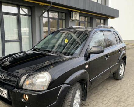 Черный Хендай Туксон, объемом двигателя 1.99 л и пробегом 290 тыс. км за 7700 $, фото 16 на Automoto.ua