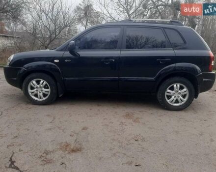 Чорний Хендай Туксон, об'ємом двигуна 1.99 л та пробігом 298 тис. км за 7750 $, фото 3 на Automoto.ua