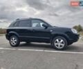 Черный Хендай Туксон, объемом двигателя 2 л и пробегом 127 тыс. км за 7590 $, фото 15 на Automoto.ua
