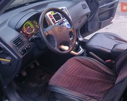 Чорний Хендай Туксон, об'ємом двигуна 1.98 л та пробігом 320 тис. км за 6500 $, фото 19 на Automoto.ua