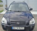 Черный Хендай Туксон, объемом двигателя 2 л и пробегом 220 тыс. км за 6700 $, фото 1 на Automoto.ua