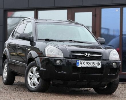 Черный Хендай Туксон, объемом двигателя 2 л и пробегом 263 тыс. км за 7950 $, фото 1 на Automoto.ua