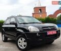 Черный Хендай Туксон, объемом двигателя 2 л и пробегом 249 тыс. км за 8300 $, фото 1 на Automoto.ua