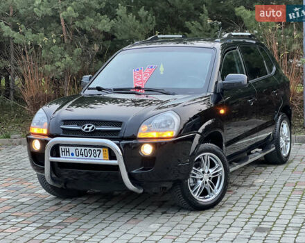 Чорний Хендай Туксон, об'ємом двигуна 1.98 л та пробігом 170 тис. км за 6999 $, фото 3 на Automoto.ua