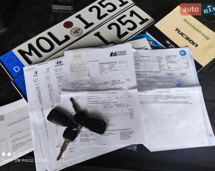 Черный Хендай Туксон, объемом двигателя 2 л и пробегом 237 тыс. км за 7999 $, фото 28 на Automoto.ua