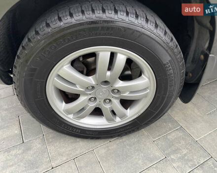 Черный Хендай Туксон, объемом двигателя 2 л и пробегом 216 тыс. км за 7500 $, фото 12 на Automoto.ua