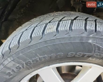 Черный Хендай Туксон, объемом двигателя 2 л и пробегом 247 тыс. км за 6300 $, фото 10 на Automoto.ua