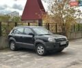 Черный Хендай Туксон, объемом двигателя 2.01 л и пробегом 246 тыс. км за 7400 $, фото 1 на Automoto.ua