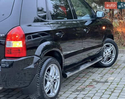 Чорний Хендай Туксон, об'ємом двигуна 1.98 л та пробігом 170 тис. км за 6999 $, фото 48 на Automoto.ua