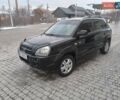 Черный Хендай Туксон, объемом двигателя 1.98 л и пробегом 270 тыс. км за 7300 $, фото 1 на Automoto.ua