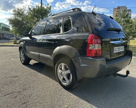 Черный Хендай Туксон, объемом двигателя 2 л и пробегом 249 тыс. км за 5800 $, фото 5 на Automoto.ua