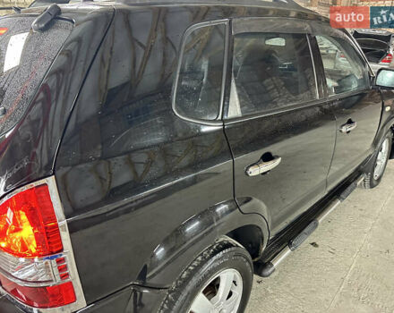 Чорний Хендай Туксон, об'ємом двигуна 2 л та пробігом 252 тис. км за 3000 $, фото 8 на Automoto.ua