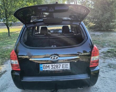 Черный Хендай Туксон, объемом двигателя 2 л и пробегом 206 тыс. км за 7500 $, фото 2 на Automoto.ua