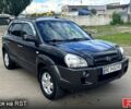 Черный Хендай Туксон, объемом двигателя 2 л и пробегом 192 тыс. км за 7700 $, фото 1 на Automoto.ua