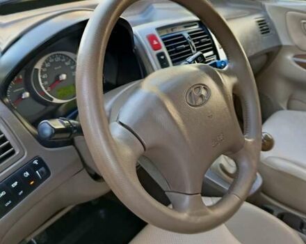 Черный Хендай Туксон, объемом двигателя 1.98 л и пробегом 256 тыс. км за 8000 $, фото 11 на Automoto.ua