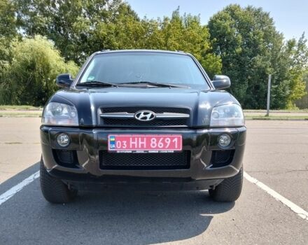 Черный Хендай Туксон, объемом двигателя 2 л и пробегом 178 тыс. км за 7600 $, фото 1 на Automoto.ua
