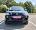 Черный Хендай Туксон, объемом двигателя 2 л и пробегом 178 тыс. км за 7600 $, фото 1 на Automoto.ua