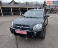 Черный Хендай Туксон, объемом двигателя 2 л и пробегом 190 тыс. км за 7100 $, фото 1 на Automoto.ua