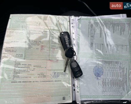 Черный Хендай Туксон, объемом двигателя 2 л и пробегом 194 тыс. км за 7250 $, фото 26 на Automoto.ua