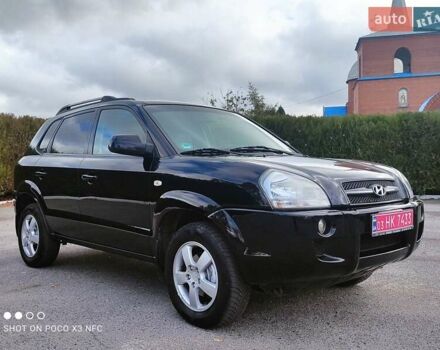 Черный Хендай Туксон, объемом двигателя 2 л и пробегом 237 тыс. км за 7999 $, фото 17 на Automoto.ua