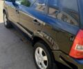 Черный Хендай Туксон, объемом двигателя 2 л и пробегом 295 тыс. км за 7700 $, фото 7 на Automoto.ua