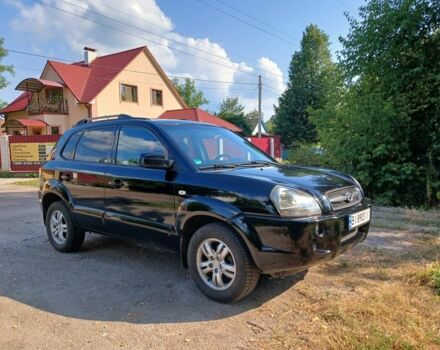 Черный Хендай Туксон, объемом двигателя 2 л и пробегом 180 тыс. км за 7600 $, фото 6 на Automoto.ua
