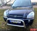 Черный Хендай Туксон, объемом двигателя 2 л и пробегом 227 тыс. км за 8000 $, фото 3 на Automoto.ua