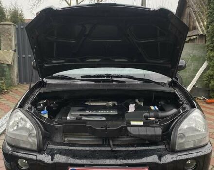 Чорний Хендай Туксон, об'ємом двигуна 1.98 л та пробігом 202 тис. км за 7350 $, фото 29 на Automoto.ua