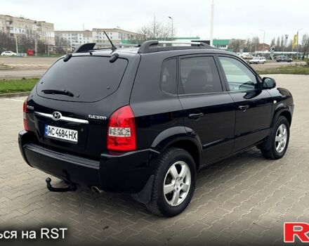 Черный Хендай Туксон, объемом двигателя 2 л и пробегом 200 тыс. км за 7800 $, фото 6 на Automoto.ua