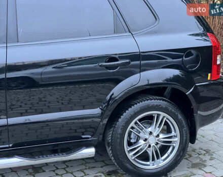 Чорний Хендай Туксон, об'ємом двигуна 1.98 л та пробігом 170 тис. км за 6999 $, фото 14 на Automoto.ua