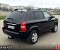 Черный Хендай Туксон, объемом двигателя 2 л и пробегом 200 тыс. км за 7800 $, фото 6 на Automoto.ua