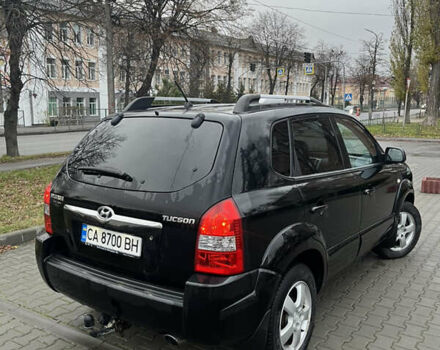 Черный Хендай Туксон, объемом двигателя 2 л и пробегом 242 тыс. км за 6999 $, фото 9 на Automoto.ua