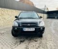 Черный Хендай Туксон, объемом двигателя 2 л и пробегом 310 тыс. км за 6600 $, фото 2 на Automoto.ua