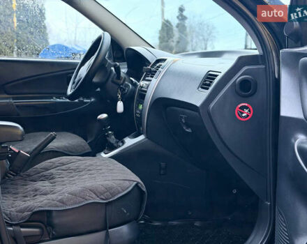 Чорний Хендай Туксон, об'ємом двигуна 1.99 л та пробігом 310 тис. км за 6399 $, фото 21 на Automoto.ua