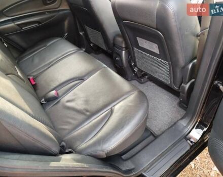 Черный Хендай Туксон, объемом двигателя 2 л и пробегом 195 тыс. км за 8300 $, фото 9 на Automoto.ua