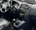 Черный Хендай Туксон, объемом двигателя 2 л и пробегом 163 тыс. км за 8400 $, фото 16 на Automoto.ua