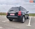 Черный Хендай Туксон, объемом двигателя 2 л и пробегом 127 тыс. км за 7590 $, фото 10 на Automoto.ua