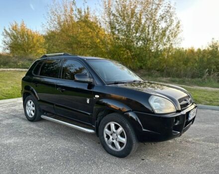 Чорний Хендай Туксон, об'ємом двигуна 2 л та пробігом 235 тис. км за 6700 $, фото 1 на Automoto.ua