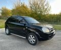Чорний Хендай Туксон, об'ємом двигуна 2 л та пробігом 235 тис. км за 6700 $, фото 1 на Automoto.ua