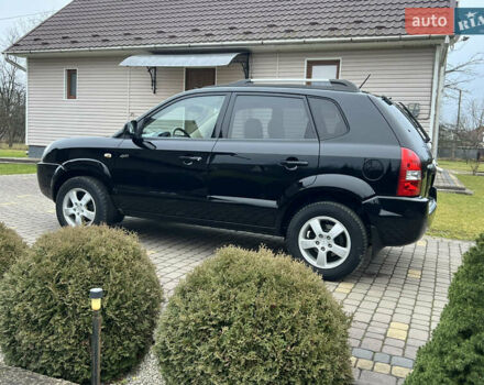 Чорний Хендай Туксон, об'ємом двигуна 1.98 л та пробігом 185 тис. км за 6850 $, фото 5 на Automoto.ua