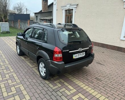 Черный Хендай Туксон, объемом двигателя 2 л и пробегом 220 тыс. км за 7200 $, фото 10 на Automoto.ua