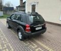 Черный Хендай Туксон, объемом двигателя 2 л и пробегом 220 тыс. км за 7200 $, фото 10 на Automoto.ua