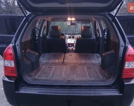 Черный Хендай Туксон, объемом двигателя 1.98 л и пробегом 320 тыс. км за 6300 $, фото 14 на Automoto.ua